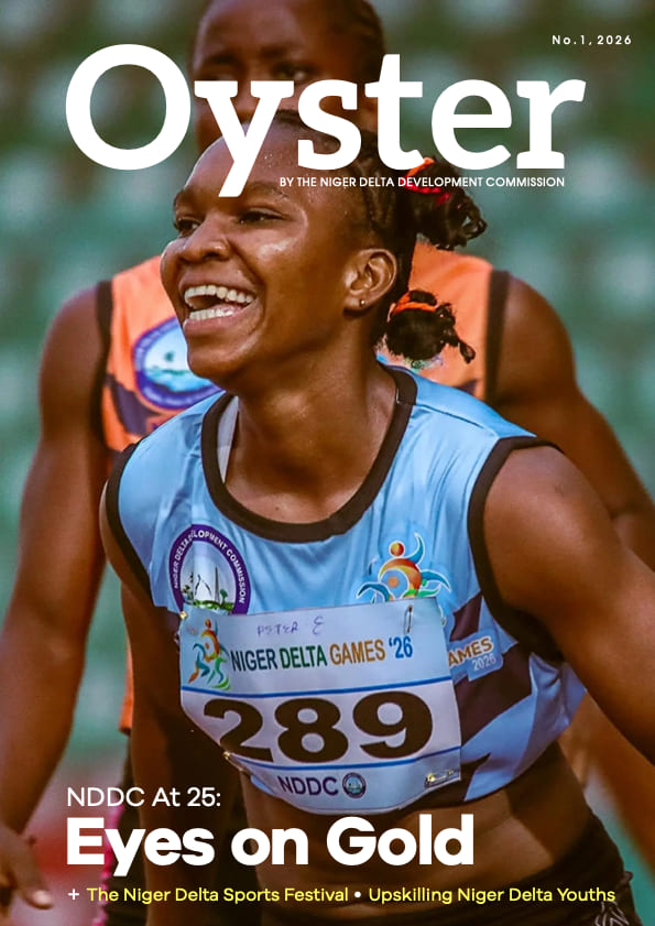 Cover of Oyster No. 1, 2026, an athlete at the Niger Delta Games under the headline “NDDC at 25: Eyes on Gold”.